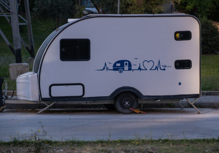 Tiny house on a trailer being prepared for transport